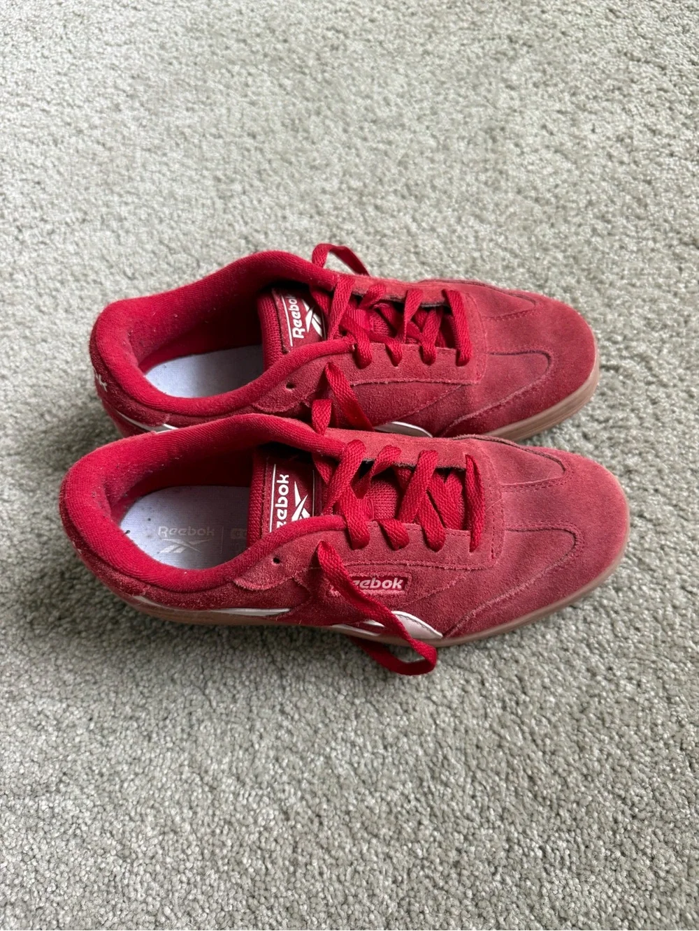 Reebok women’s Red Suede Low-Top Sneakers